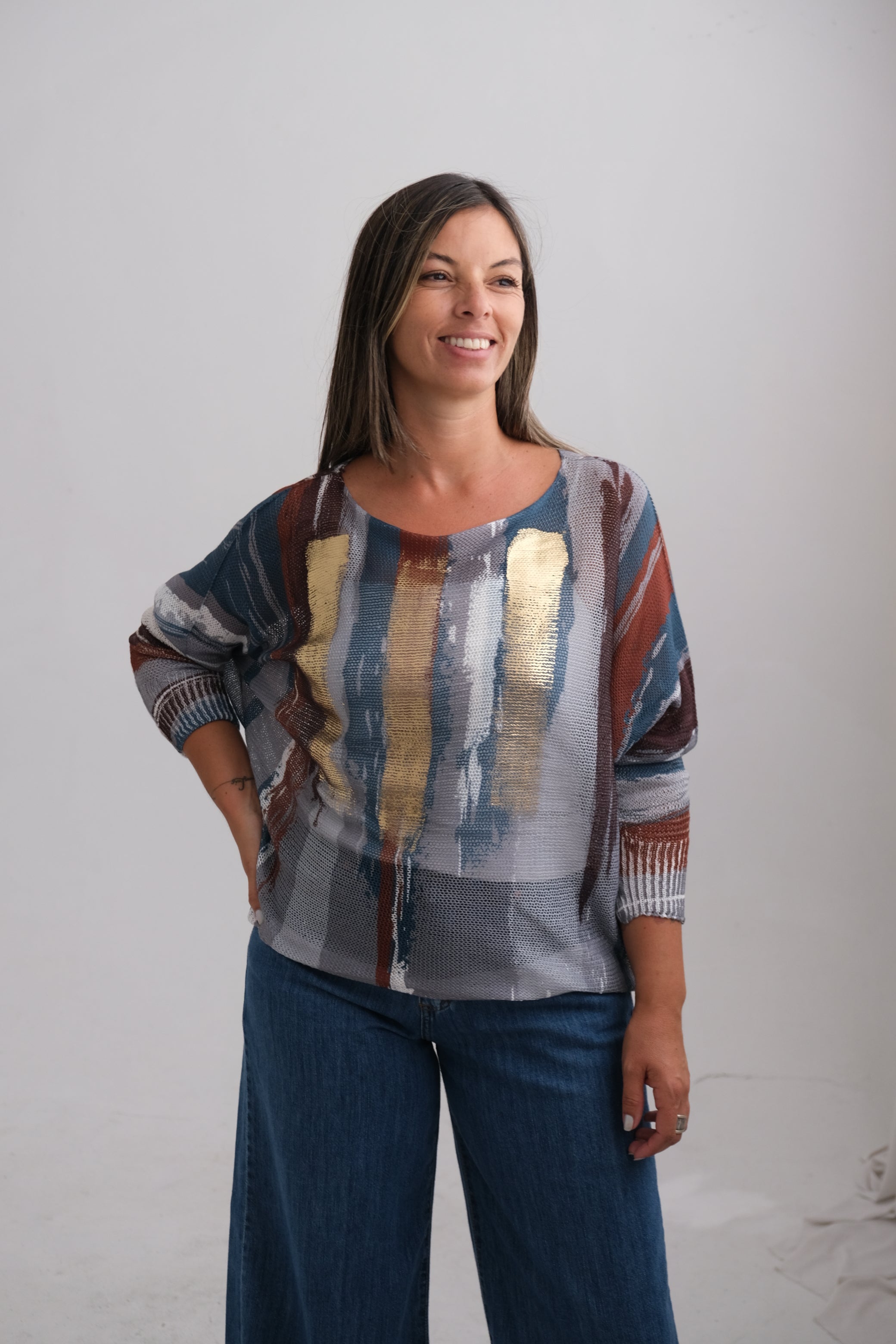 Sweater Cardamomo Terracota y Petróleo