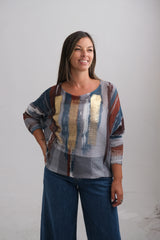 Sweater Cardamomo Terracota y Petróleo