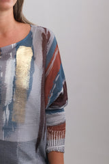 Sweater Cardamomo Terracota y Petróleo