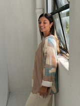 Sweater Nova Camel con Petróleo
