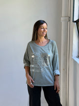 Remera detalle lentejuela Verde