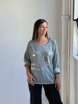 Remera detalle lentejuela Verde