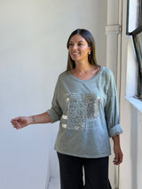 Remera detalle lentejuela Verde