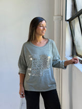 Remera detalle lentejuela Verde