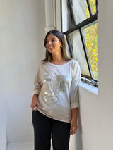 Remera detalle lentejuela Beige